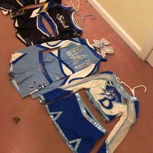 Lot of 5 All Star cheerleading uniforms